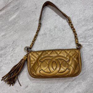 AUTHENTIC CHANEL CAVIAR QUILTED TASSEL POCHETTE - GOLD